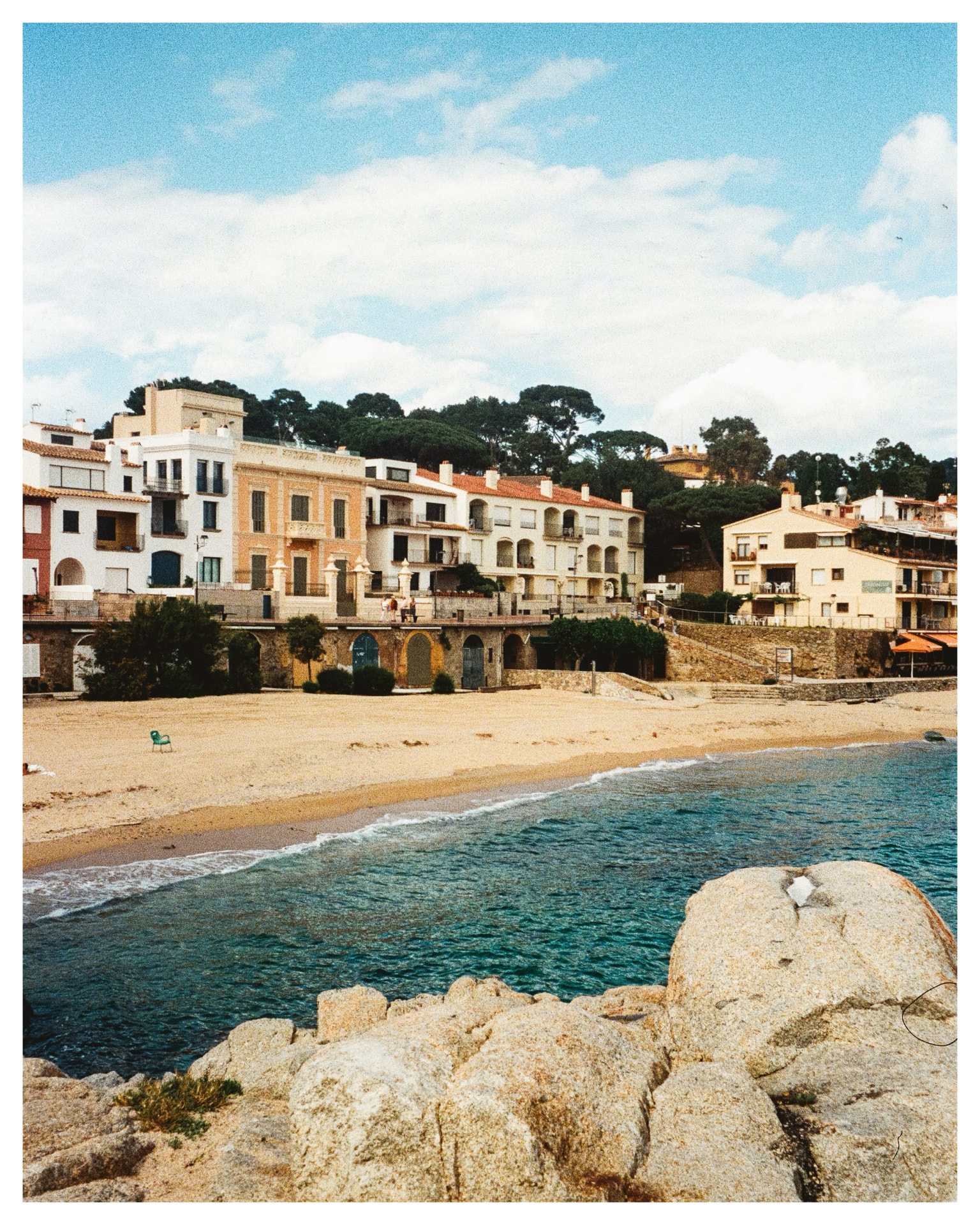 Rocky Mediterranean beach and waterfront houses