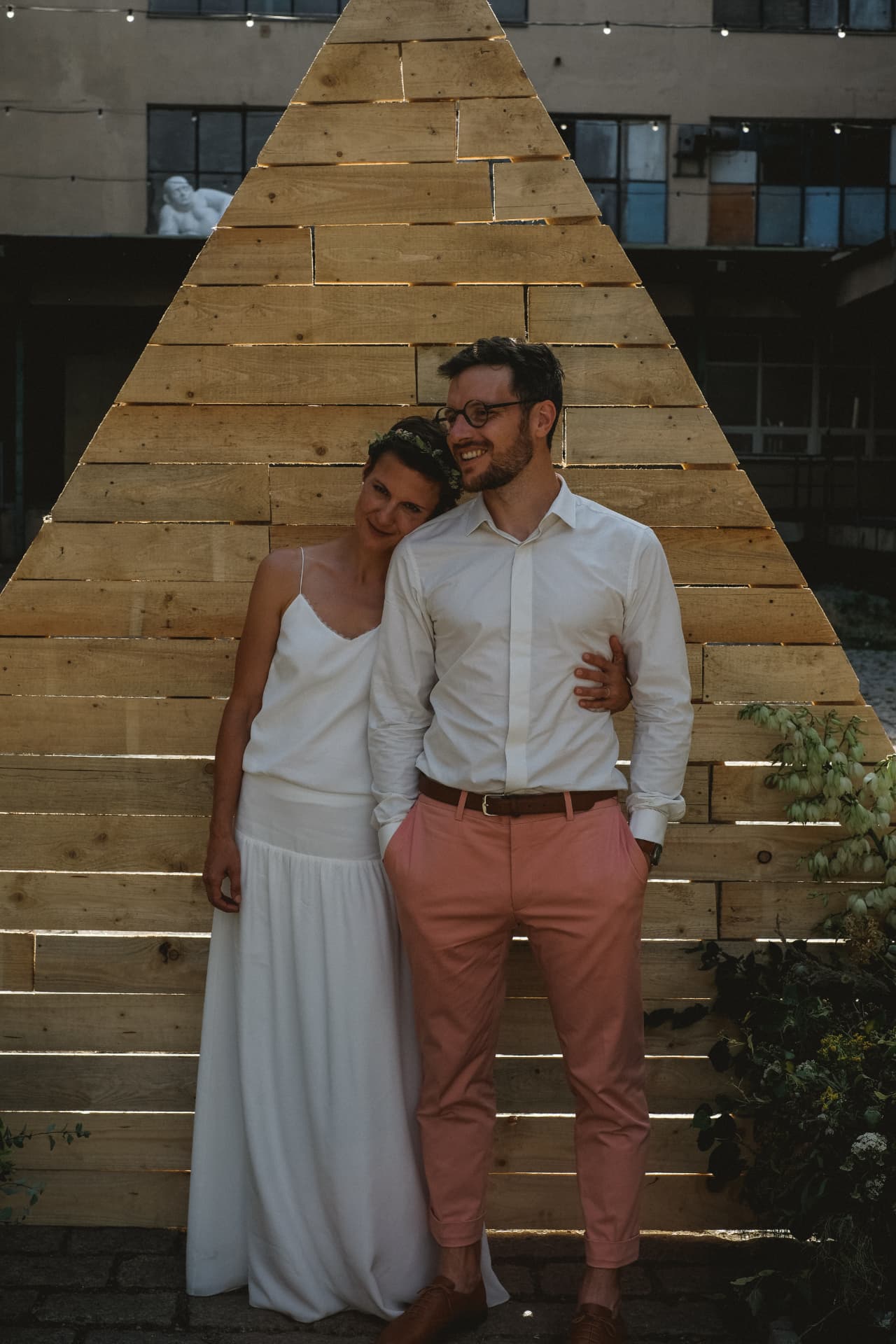 Newlyweds standing together at Pragovka