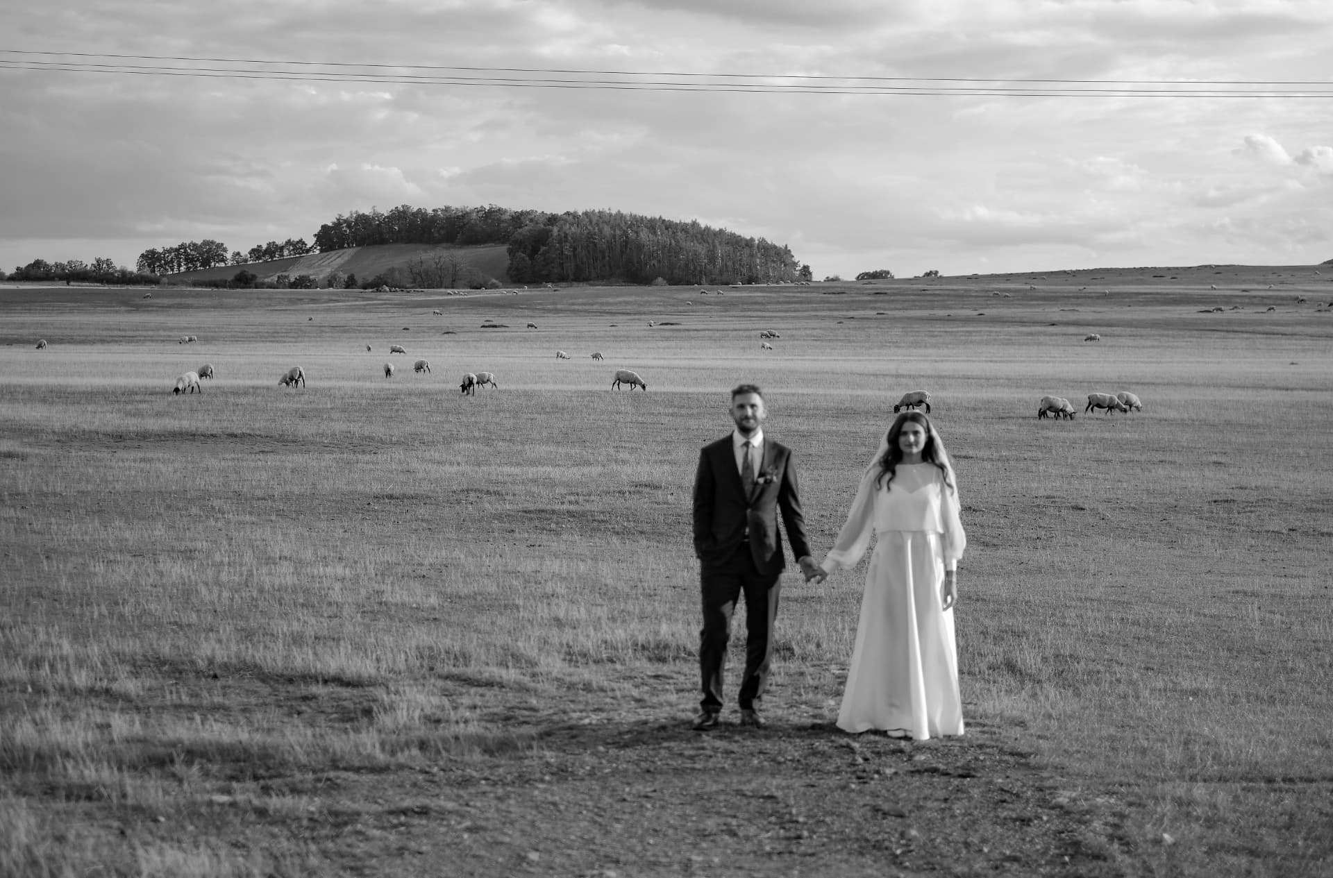 Newlyweds standing together outdoors